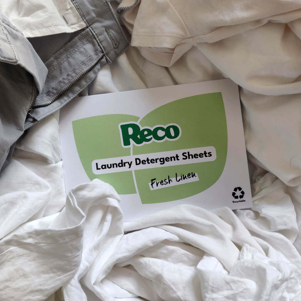 Reco Laundry Detergent Sheets Packet in the middle of laundry